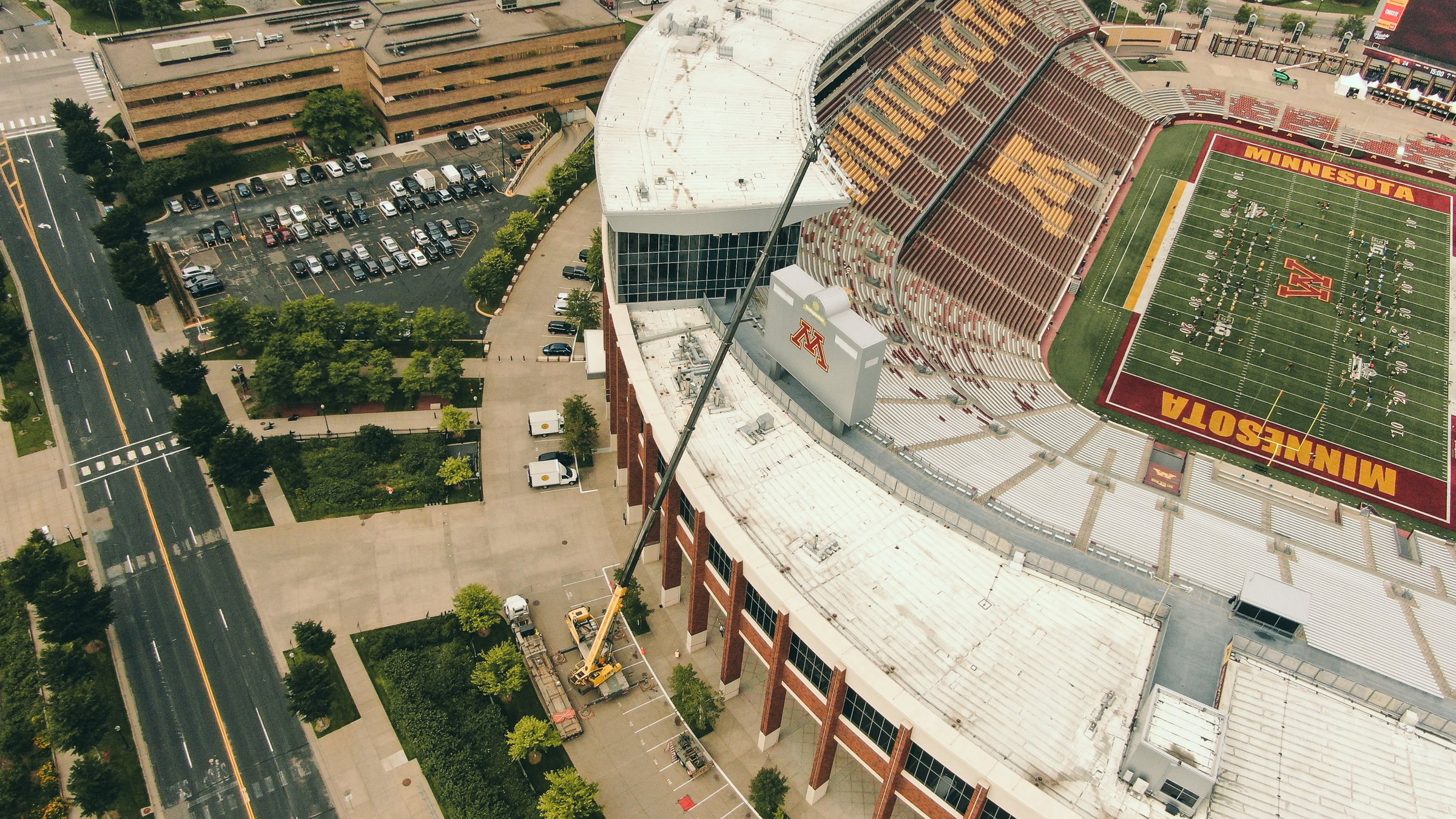 Aerial drone view of a stadium and job site